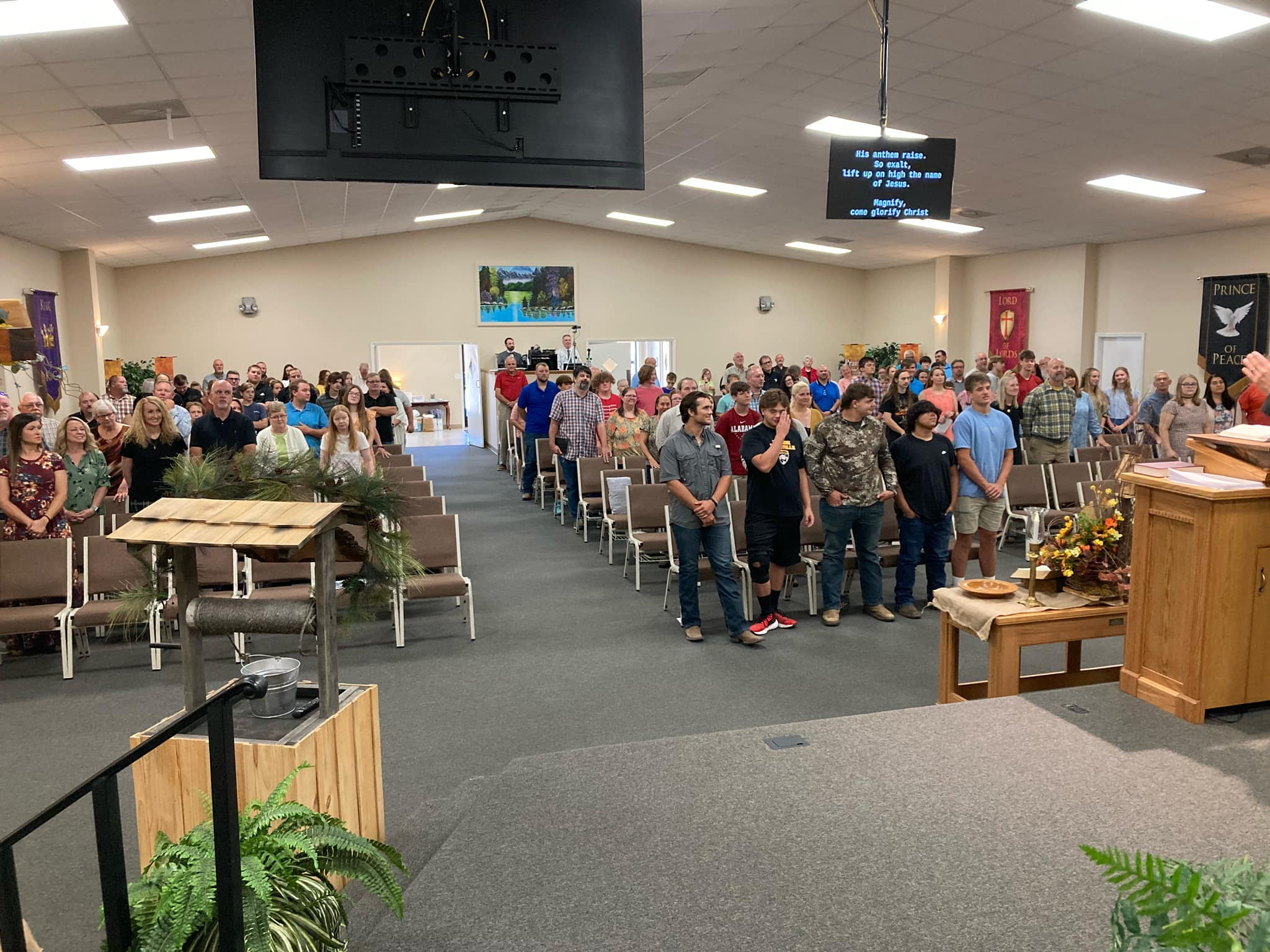 Congregation standing in worship at Springhill United Baptist Church